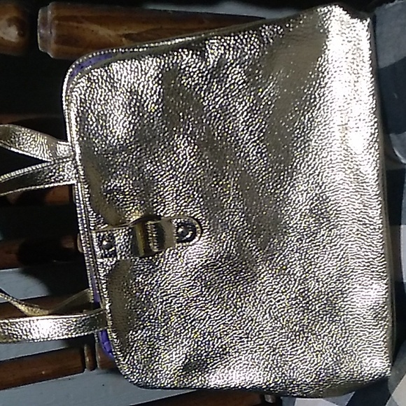 ⭐️ Gold tone makeup bag with purple on inside - Picture 5 of 5